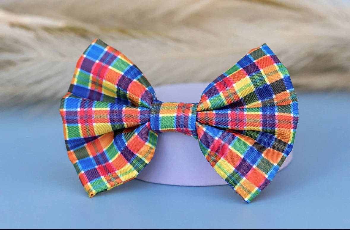 Plaid Dog bow tie is multiple colours - blue, yellow and orange. 