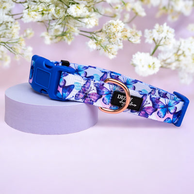 Butterfly Dog Collar  Description: An adjustable dog collar featuring the same elegant butterfly pattern, complete with a rose gold D-ring and a quick-release buckle.